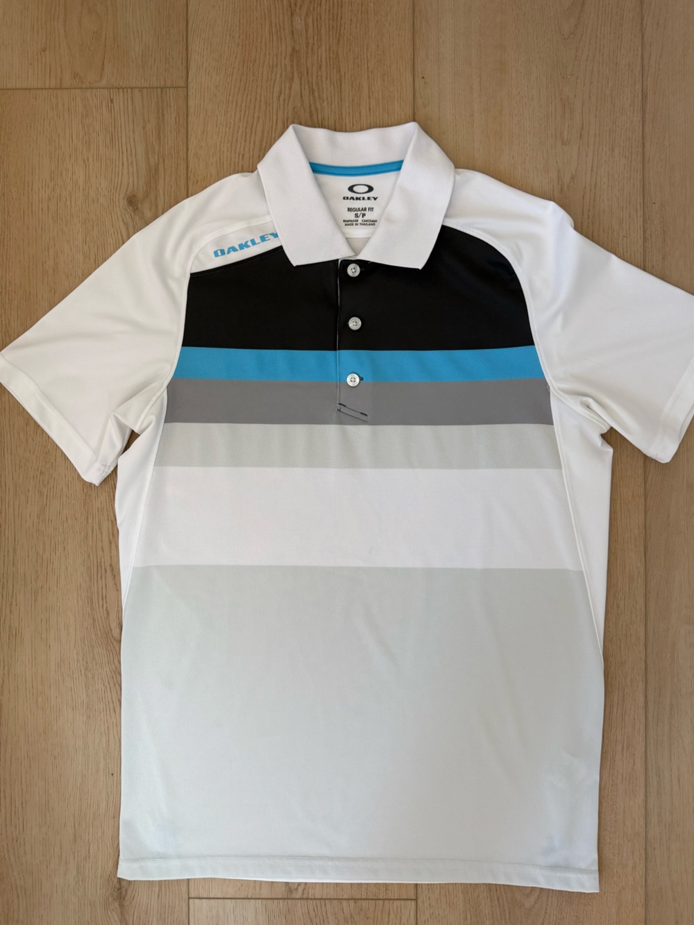 Oakley Men's White Athletic Polo with Logo and Striped Panels Regular Fit S